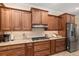 Kitchen featuring stainless steel appliances, granite countertops, and ample storage at 8445 Sw 93Rd Cir, Ocala, FL 34481