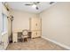 Office space including a desk, chair, shelving, and window providing ample natural light at 8445 Sw 93Rd Cir, Ocala, FL 34481