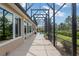 The covered patio has an enclosed lanai with plenty of room for outdoor activities at 8445 Sw 93Rd Cir, Ocala, FL 34481