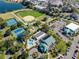 Aerial view of tennis courts, softball field, community center, and pool at 12333 Se 177Th Loop, Summerfield, FL 34491