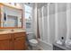 Traditional bathroom featuring a shower, bathtub, vanity, and toilet at 12333 Se 177Th Loop, Summerfield, FL 34491