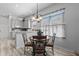 Cozy eat-in kitchen area featuring a charming breakfast table and views of the well-equipped cooking space at 12333 Se 177Th Loop, Summerfield, FL 34491