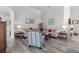 Spacious living room designed for comfort, showcasing tasteful decor, a soothing color palette, and luxury flooring at 12333 Se 177Th Loop, Summerfield, FL 34491