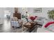 Cozy living room featuring elegant furnishings, plush seating, and a warm, inviting atmosphere at 12333 Se 177Th Loop, Summerfield, FL 34491
