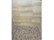 The shower features elegant tile and a mosaic tile floor at 3 Dogwood Trl, Ocala, FL 34472