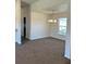 Dining room featuring a decorative chandelier and a large window at 6272 Sw 155 Street Rd, Ocala, FL 34473