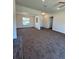 Spacious open living room with carpet at 6272 Sw 155 Street Rd, Ocala, FL 34473