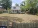 Charming two-story home featuring a well-maintained front yard and inviting curb appeal at 5120 Se 145Th St, Summerfield, FL 34491