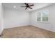 Bright bedroom featuring tile flooring, a window, and ceiling fan at 7709 Sw 86Th Ct, Ocala, FL 34481