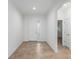 Bright foyer featuring neutral tones, tiled floor, and entry door with sidelight at 7709 Sw 86Th Ct, Ocala, FL 34481