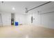 Spacious two-car garage featuring sealed floors and plenty of storage at 7709 Sw 86Th Ct, Ocala, FL 34481