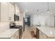 Spacious kitchen featuring stainless steel appliances, granite countertops, and an open layout at 7709 Sw 86Th Ct, Ocala, FL 34481