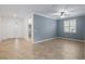 Open living room with tile flooring, crown moulding, and views to additional rooms at 7709 Sw 86Th Ct, Ocala, FL 34481