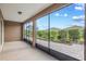 Covered patio with views of the backyard landscaping and blue skies at 7709 Sw 86Th Ct, Ocala, FL 34481