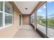 Covered patio with paved floors, recessed lighting, and views of the landscaped backyard at 7709 Sw 86Th Ct, Ocala, FL 34481