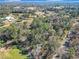 Aerial view of property showing expansive land and trees at 7131 Sw 19Th Avenue Road Rd, Ocala, FL 34476