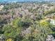 Aerial view of property showing a house and surrounding trees at 7131 Sw 19Th Avenue Road Rd, Ocala, FL 34476