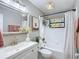 Updated bathroom with white subway tile, a bathtub, and modern fixtures at 7131 Sw 19Th Avenue Road Rd, Ocala, FL 34476