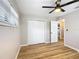 Spacious bedroom with double closets and wood-look floors at 7131 Sw 19Th Avenue Road Rd, Ocala, FL 34476