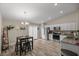 Bright kitchen with stainless steel appliances, granite counters, and open layout connecting to the dining area at 7336 Sw 131St Ln, Ocala, FL 34473