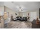 Inviting living space featuring neutral tones, recessed lighting, and seamless flow with the kitchen area at 7336 Sw 131St Ln, Ocala, FL 34473