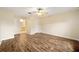 Bedroom featuring laminate flooring and ensuite bath access, plus a closet for storage at 4937 Nw 30Th Pl, Ocala, FL 34482