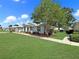 Charming single-story home featuring a well-manicured lawn and a classic architectural design at 4937 Nw 30Th Pl, Ocala, FL 34482