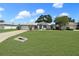 Charming single-story home featuring a well-manicured lawn and a classic architectural design at 4937 Nw 30Th Pl, Ocala, FL 34482