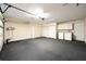 Spacious garage featuring washer and dryer, storage cabinets and plenty of room for parking at 4937 Nw 30Th Pl, Ocala, FL 34482