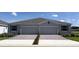 Charming single story home features a two car garage and neatly landscaped front yard at 4737 Nw 39Th Street Rd, Ocala, FL 34482