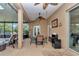 Covered patio featuring a dining table and chairs with a view of the yard at 6925 Se 96Th Place Rd, Belleview, FL 34420