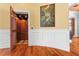 An elevator adds luxury and convenience, with wood paneling and classic design at 17800 Se 237Th Ct, Umatilla, FL 32784