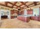 Gourmet kitchen features custom wood cabinets, a large center island and an open floor plan at 17800 Se 237Th Ct, Umatilla, FL 32784
