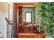 Classic home office featuring rich wood finishes, built-in bookshelves, and a comfortable workspace at 17800 Se 237Th Ct, Umatilla, FL 32784
