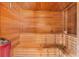 This sauna features wooden benches and paneling for a relaxing spa-like experience at 17800 Se 237Th Ct, Umatilla, FL 32784