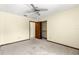 Bedroom with ceiling fan and carpet flooring at 21406 Sw Plantation St, Dunnellon, FL 34431