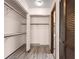 Large walk-in closet with built-in shelving at 21406 Sw Plantation St, Dunnellon, FL 34431