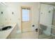 Clean bathroom featuring a sink with a walk-in shower at 4215 Se 24Th Ter, Ocala, FL 34480