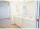 Bright bathroom with dual sinks and modern vanity at 4215 Se 24Th Ter, Ocala, FL 34480