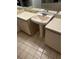 Bathroom with pedestal sink, double vanities, and tiled floor at 4215 Se 24Th Ter, Ocala, FL 34480