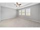 Spacious bedroom with ceiling fan and window shutters at 4737 Se 36Th St, Ocala, FL 34480