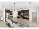 Modern kitchen with dark wood cabinets and granite island at 4737 Se 36Th St, Ocala, FL 34480