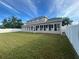 Large fenced backyard and enclosed back patio providing ample space for outdoor living at 3403 Gatlin Place Cir, Orlando, FL 32812