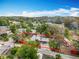 Overhead shot of property inside red line surrounded by dense trees and established neighborhood at 34828 1St Ave, Leesburg, FL 34788