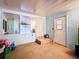 Bonus room with exterior access and large viewing window at 34828 1St Ave, Leesburg, FL 34788