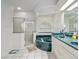Bathroom featuring a tiled walk-in shower, dark green tub, and double vanity at 4893 Sw 4Th Cir, Ocala, FL 34471