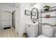 The bathroom is equipped with a vanity and a shower at 4893 Sw 4Th Cir, Ocala, FL 34471