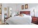Comfortable bedroom with wood furniture and neutral decor at 4893 Sw 4Th Cir, Ocala, FL 34471