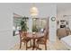 Cozy breakfast nook with view of pool and access to the living room at 4893 Sw 4Th Cir, Ocala, FL 34471