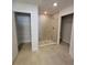 Clean and modern bathroom featuring a glass-enclosed shower and ample storage space at 5892 Sw 82Nd Ln, Ocala, FL 34476